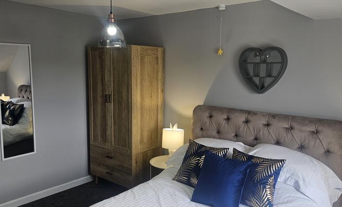 The Redford Cwtch Lounge – a cosy, welcoming space with soft seating, warm lighting, and rustic charm, perfect for relaxing with family or friends aft